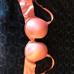 Pink and white lace bra